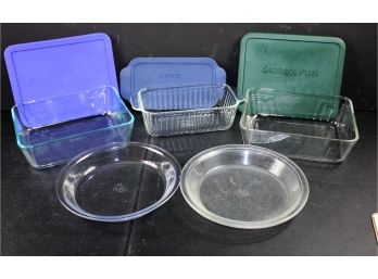 Three Pyrex Dishes With Lids And Two Pie Plates