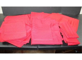 Multiple Red Tablecloths And Napkins