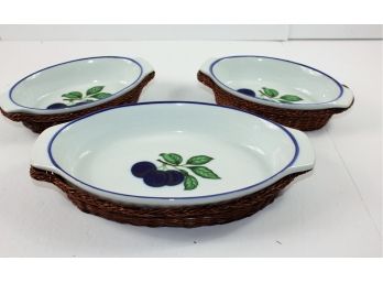 3 Ceramic Serving Dishes In Baskets - 1- 10 Inch Oval, 2-  7 Inch Oval