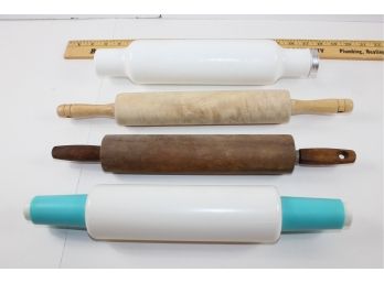 4 Rolling Pins - 2 Wooden, One Plastic, One White Glass With Possible Crack
