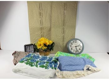 Table Covers - 2 Vinyl, Two Fabric, Two Clocks, 2 Scarf And Belt Organizer, One Yellow Floral Arrangement