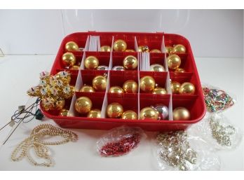 Sterilite Ornament Holder Filled With Gold Balls, Beads And Working Lighted Star