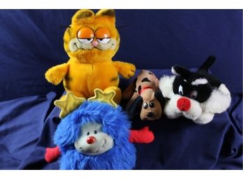Four Stuffed Animals - 1981 Garfield, 1983 Mattel, Small Pound Puppy, 1987 Sylvester
