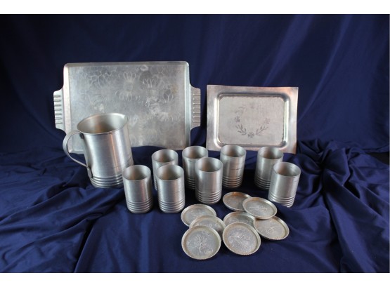 8 Aluminum Drinking Cups, 8 Coasters, One Pitcher, Two Platters Aluminum