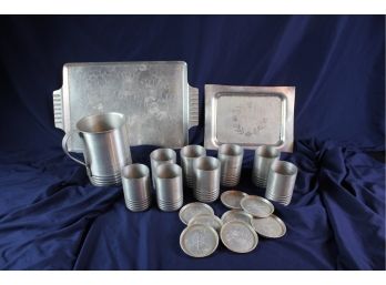 8 Aluminum Drinking Cups, 8 Coasters, One Pitcher, Two Platters Aluminum
