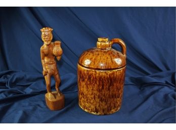 Ceramic Jug And Carved Wooden Man