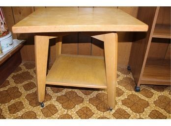 Blonde Wood Table On Rollers - Top Swivels