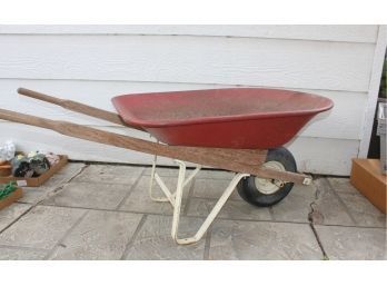 Red Metal And Wood Wheelbarrow