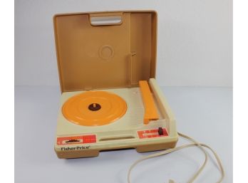 Vintage Fisher-Price Record Player  Plugged-in And Turns