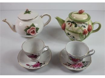 2 Teapots - 1 Teleflora - 2 Cups And Saucers From China