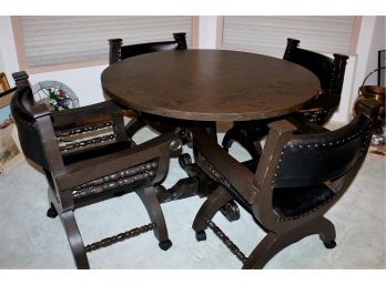 Round Table 45.5 Diameter X 30 In Tall With Four Leather Padded Chairs On Rollers