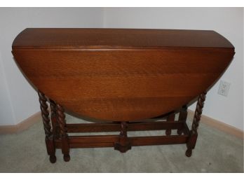 Drop Leaf Table 11 X 42 W Folded Up With Spindle Legs - Leafs Extended 42 In Diameter - Beautiful Condition