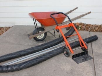 Wheelbarrow (has Some Rust & Deflated Tire) Dolly (needs Screws) 2 Drainage Hoses & 2 PVC Conduit