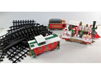 New Bright Plastic Musical Train With Track, Engine, Caboose, Coal Car, ELF Car In Plastic Tote With Lid