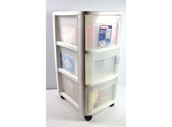 Three-drawer Sterilite Cart On Rollers With Lots Of Opened Kleenex