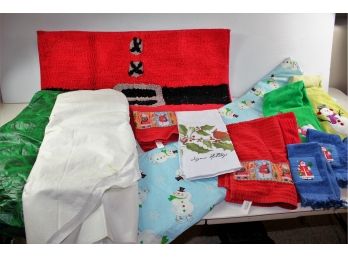 Christmas Rug And Three Plastic Tablecloths, Multiple Christmas Towels