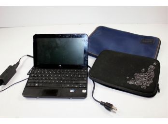 Small HP Laptop With Windows 7-Powers Up With Case And Miscellaneous Case