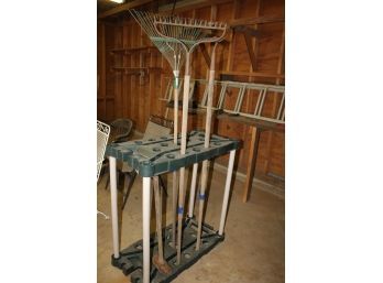 Yard Tool Rack With Two Rakes, Hoe And Sledgehammer