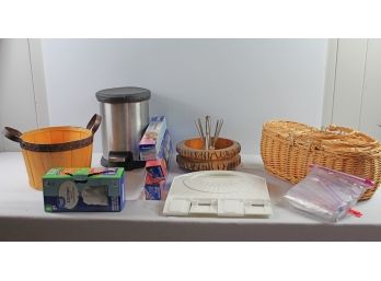 Two Baskets, Small Trash Can, Partial Box Of Foil, Parchment, Trash Bags, Nut Bowl