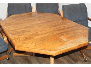 Wood Dining Table 5 Ft X 3.5 Ft With 4 Rolling Chairs With Arms