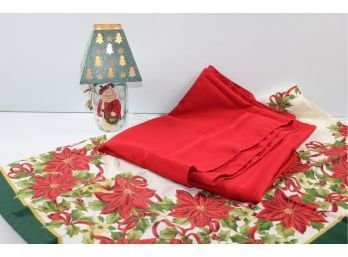 Two Tablecloths 50 X 70 Poinsettia, 68 X 52 Red And Lighted Santa Jar