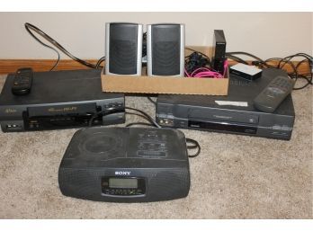 Electronics-Toshiba VCR, Sv2000 VCR, Two Speakers, Sony CD Radio Alarm, Router