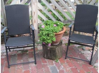 Two Folding Patio Chairs With Flower Pot