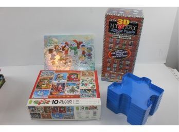 Lot 4 Of Puzzles Including Ravensburger Puzzle Piece Holders