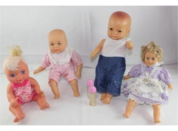4 Baby Dolls, 1 With Additional Clothes