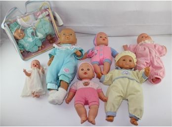 7 Misc. Baby Dolls, 5 Soft Cloth Body, 2 Vinyl Body, 1 In Bag With Play Cloths