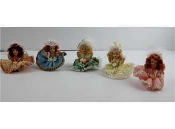 6 Sitting Porcelain Dolls In Lovely Dresses And Hats  3'