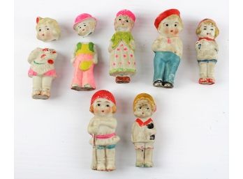7 All Bisque - 4 Inch Dolls Made In Japan In Home Made Bag. 2 Have Broken Heads - Made In Japan