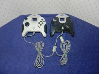 PAIR OF SONY DREAMCAST MADCATZ CONTROLLERS
