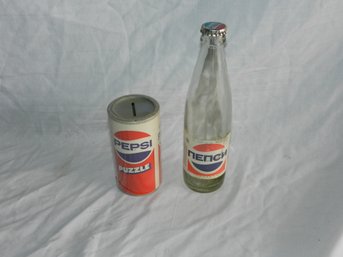 VINTAGE 1980S PEPSI PUZZLE COIN BANK (SEALED) AND RUSSIAN? BOTTLE