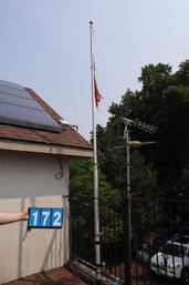 Tall Flag Pole - Outside Of House