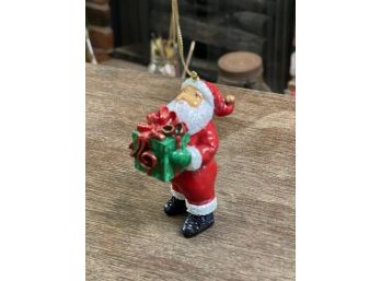Vintage Santa Holding A Christmas Gift Ornament Collectible Curly Beard