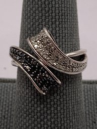 Elegant White And Black Diamond Bypass Ring