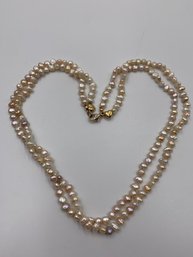 Lustrous Creamy Pearls With Gold And Diamond Clasp