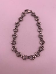 Romantic Sterling Silver Diamond Heart Bracelet.