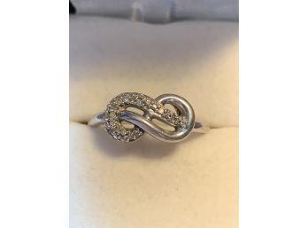 Lovely Genuine Diamond And Sterling Silver Infinity Ring