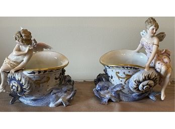 Pair Of Meissen Style Planters With Angel And Fairy On Dolphin Supports