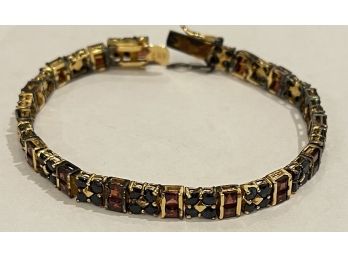 Stunning Gold Over Sterling Silver Bracelet With Garnets And Sapphires