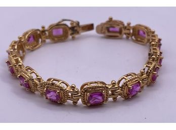 Stunning Gold Over Sterling Silver Simulated Ruby Tennis Bracelet