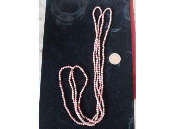 60 Inch Long Strand Of Coral Beads
