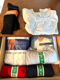 Two Drawers Of Clothing Items