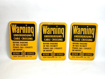 Three Metal Warning Signs
