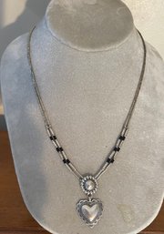 Silver Toned Necklace With Heart Pendant And Dark Blue Beads