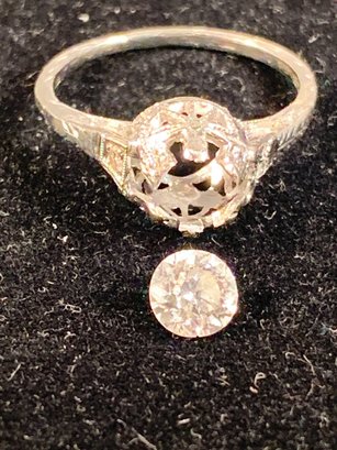 Petite .30 Carat Emerald and Diamond Halo Ring