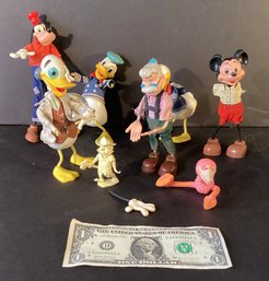 Vintage Marx  Moveable Toys Disney Figures Including A Small Plastic Bird And Fireman Figure.
