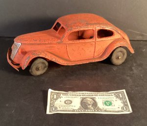 Antique Kingsbury Toy Co.  Orange Chrysler Airflow  Vehicle  With Wind Up Mechanism.